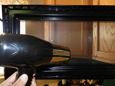 Cleaning Between The Mesh Screen And Glass Door On Your Microwave Make It Or Fix It Yourself